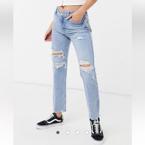 Bershka slim jeans with distressed hem in light blue US size 6